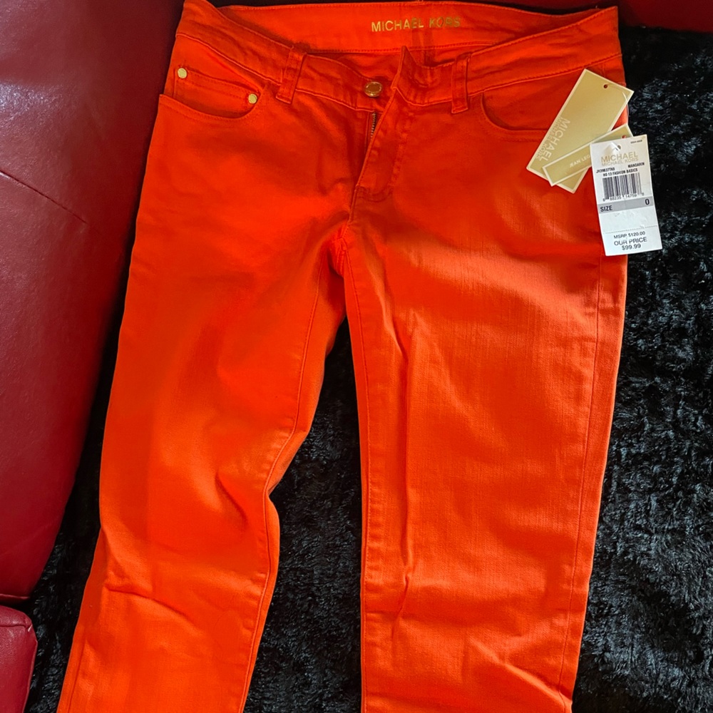 Michael Kors burnt orange Jean leggings. Brand new with original tags.